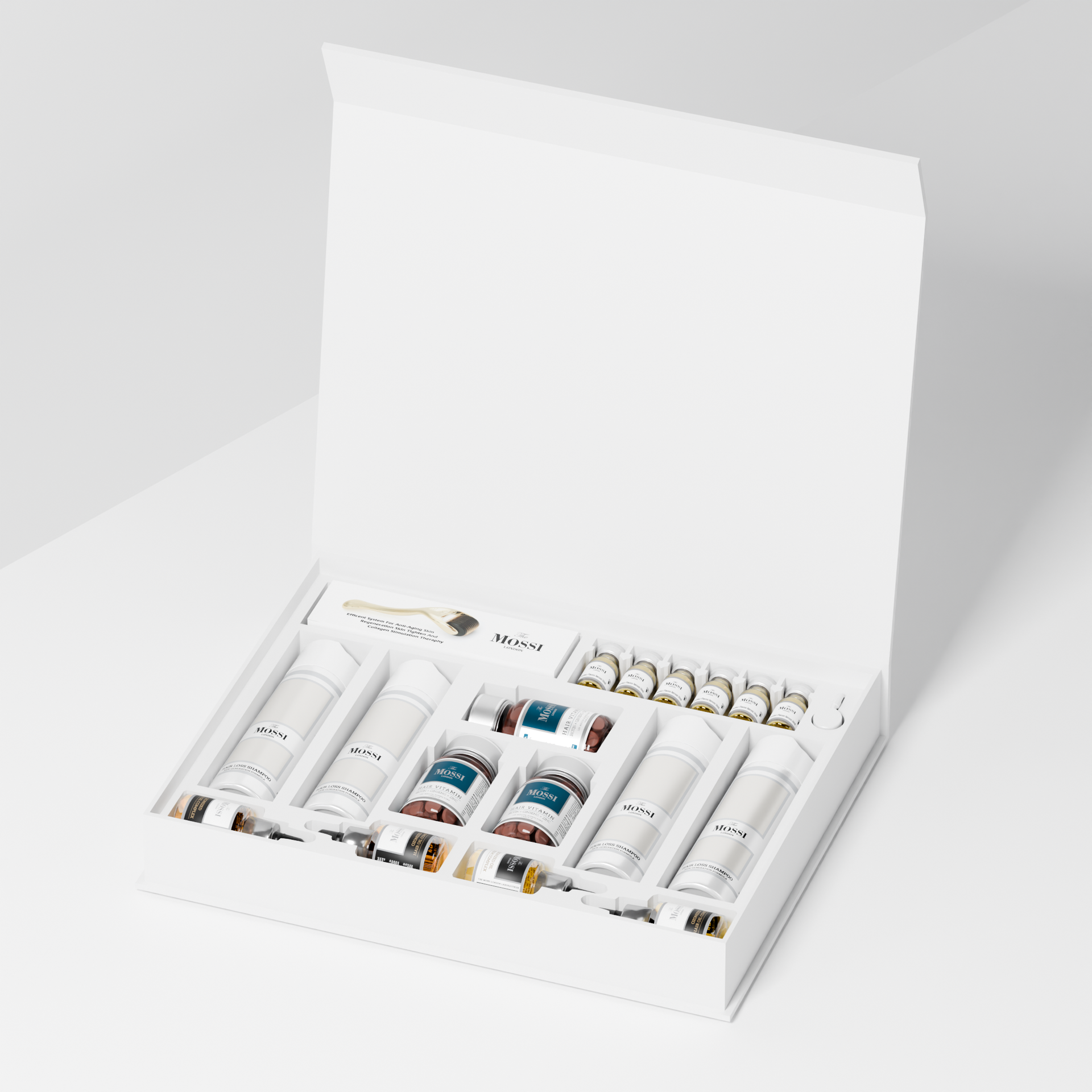 Kit Mossi London 6 Mois — Coffret prolongé de soins post-greffe capillaire Kit Mossi London 6 mois ouvert avec les 6 produits en quantités prolongées : 4 shampoings, 3 Oil Complex, 3 boîtes de vitamines, 6 Flacon Serums, Oil Serum et Dermaroller